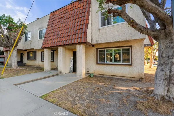 a front view of a house with a garage
