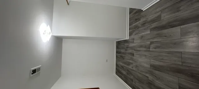 a view of an empty walk in closet