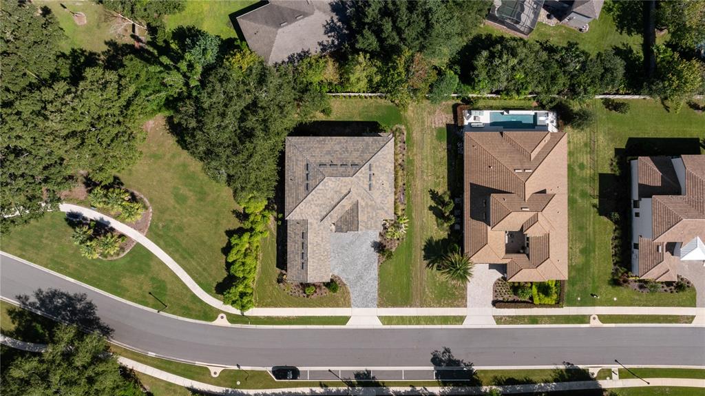 10199 Brocksport Circle Gotha, FL 34734 - Photo 12 of 82 an aerial view of residential house with outdoor space and swimming pool