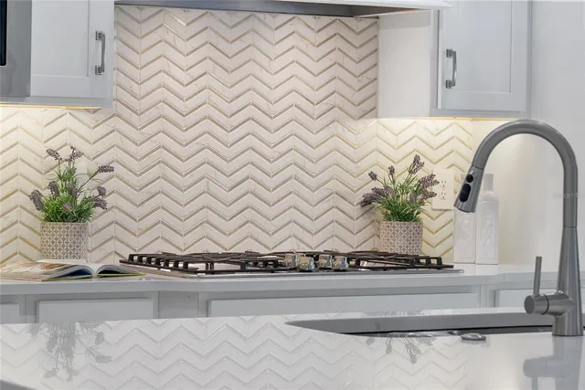 a bathroom with a double vanity sink toilet and a mirror