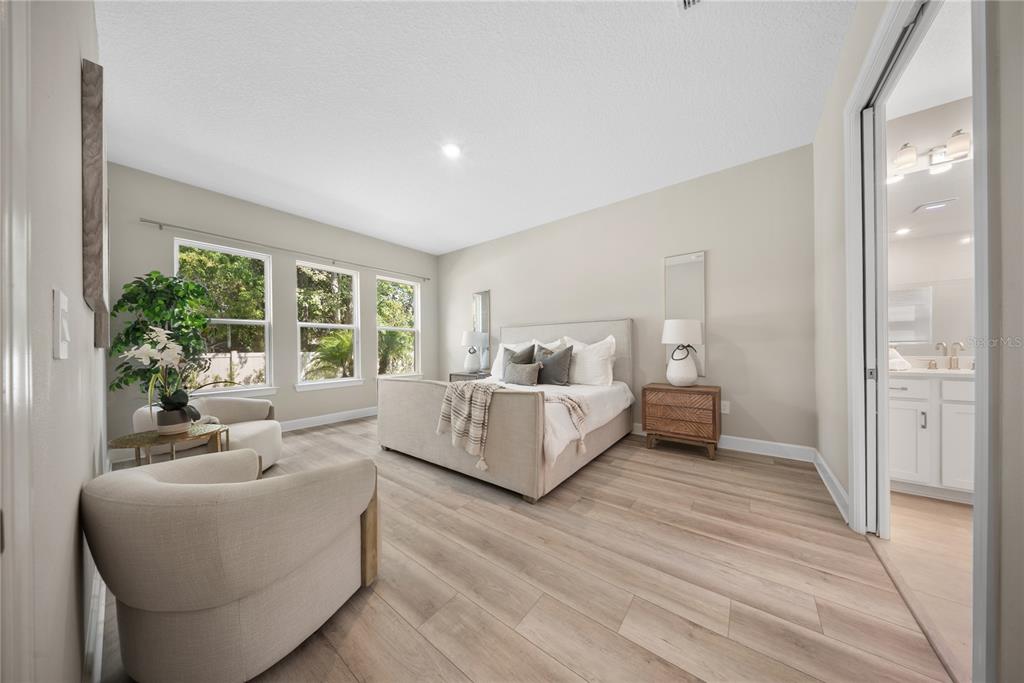 10199 Brocksport Circle Gotha, FL 34734 - Photo 36 of 82 a living room with furniture and a large window