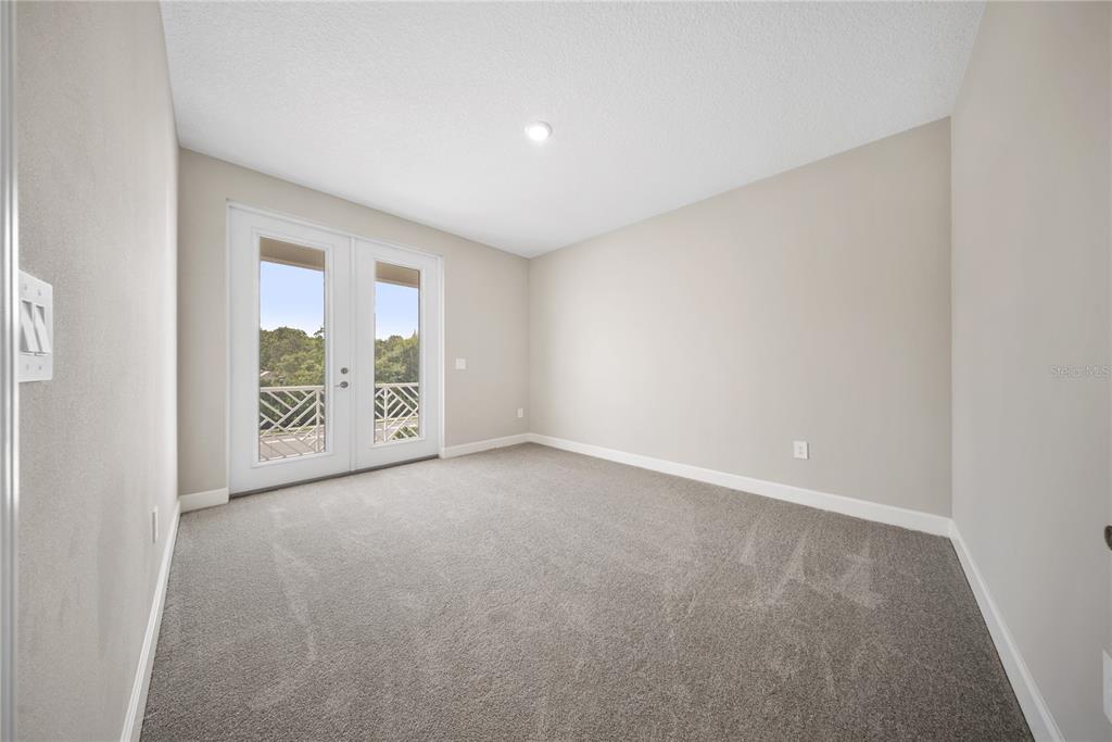 10199 Brocksport Circle Gotha, FL 34734 - Photo 55 of 82 an empty room with windows