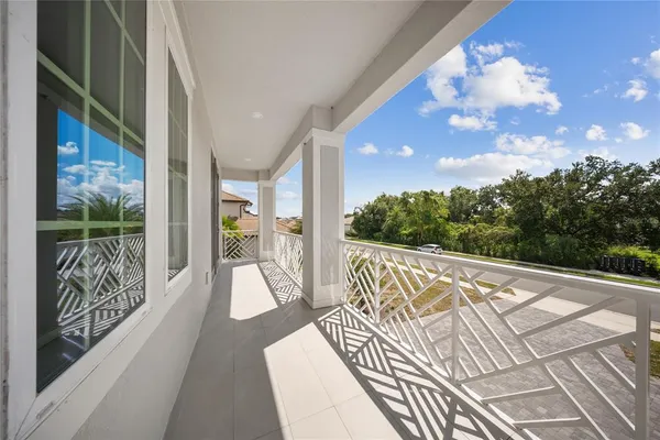 an aerial view of residential house with outdoor space and swimming pool