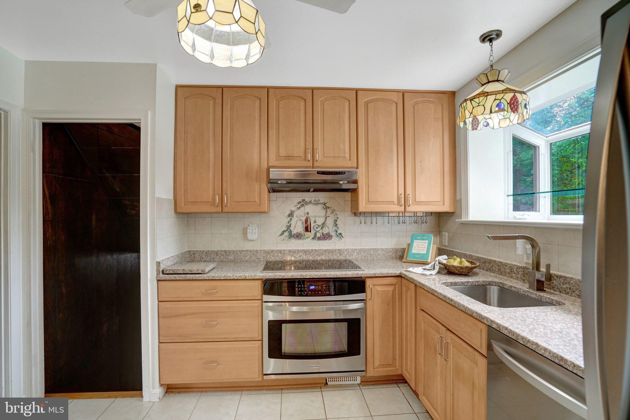 4902 Ravensworth Road Annandale, VA 22003 - Photo 20 of 63 Kitchen with updated counters, appliance