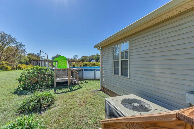 a view of a chairs and table in the patio