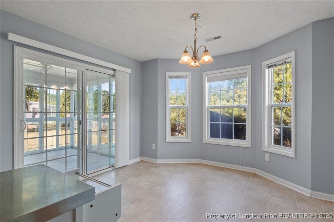 103 Beaumont Court Raeford, NC 28376 - Photo 27 of 50 a view of an empty room with a window