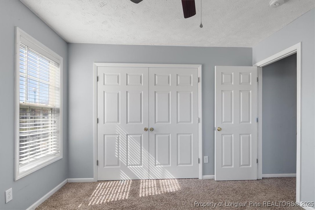 103 Beaumont Court Raeford, NC 28376 - Photo 39 of 50 a view of an empty room with window and cabinet