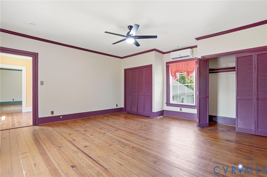 2297 Indian Oak Road Crewe, VA 23930 - Photo 36 of 53 a view of empty room with wooden floor and fan