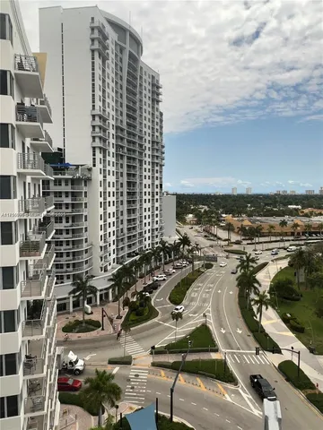 a view of a city with tall buildings