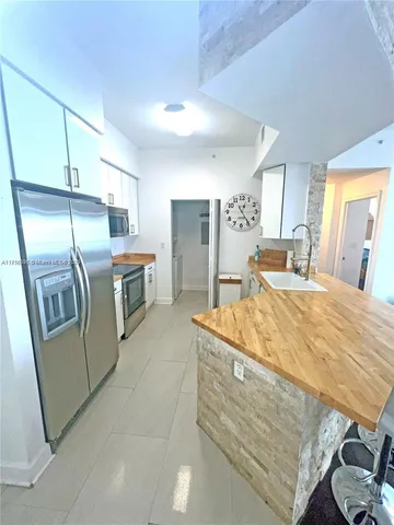 a bed room with a bed and furniture