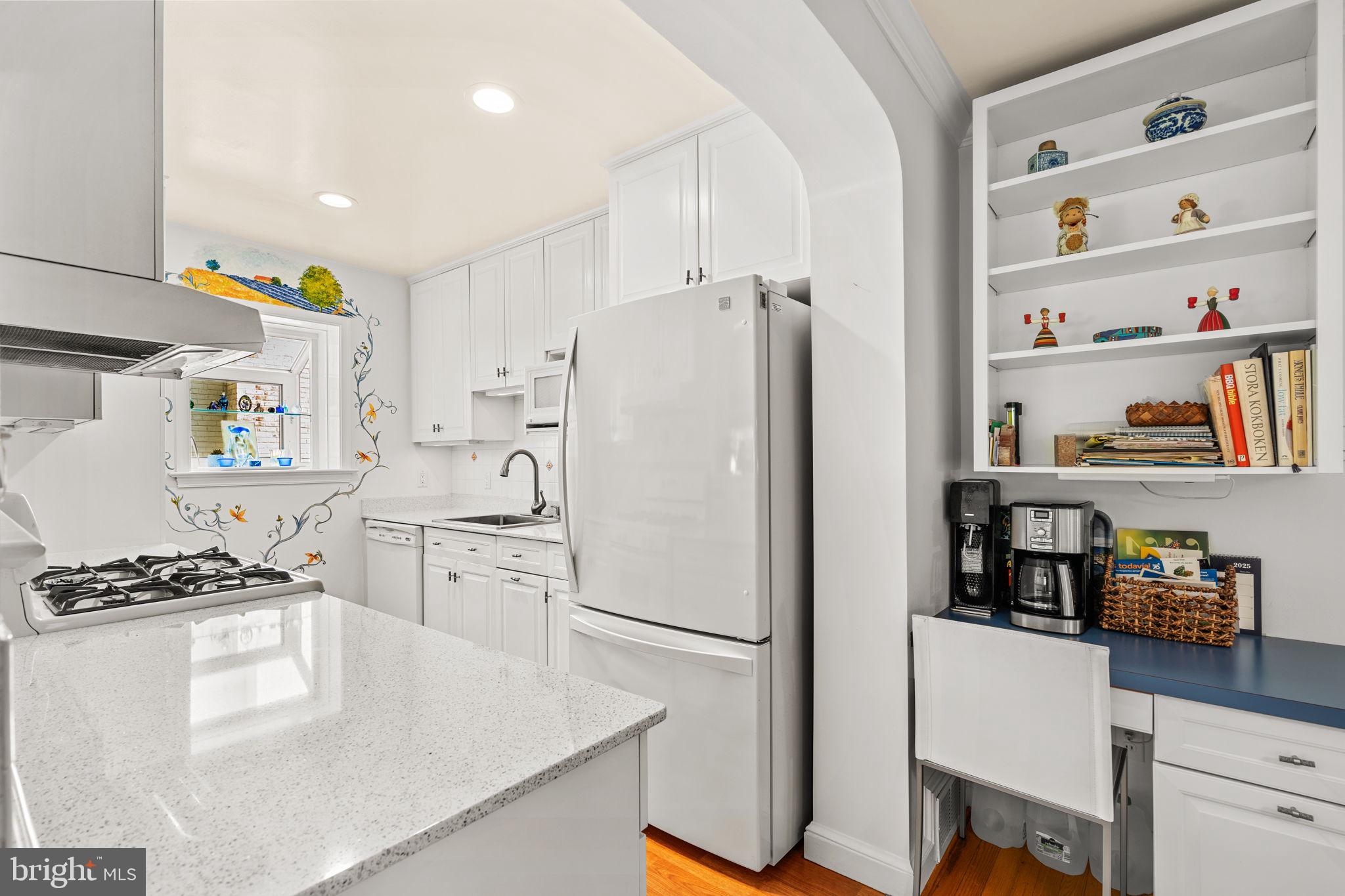 9508 Bruce Drive Silver Spring, MD 20901 - Photo 13 of 50 a white refrigerator freezer sitting inside of a kitchen