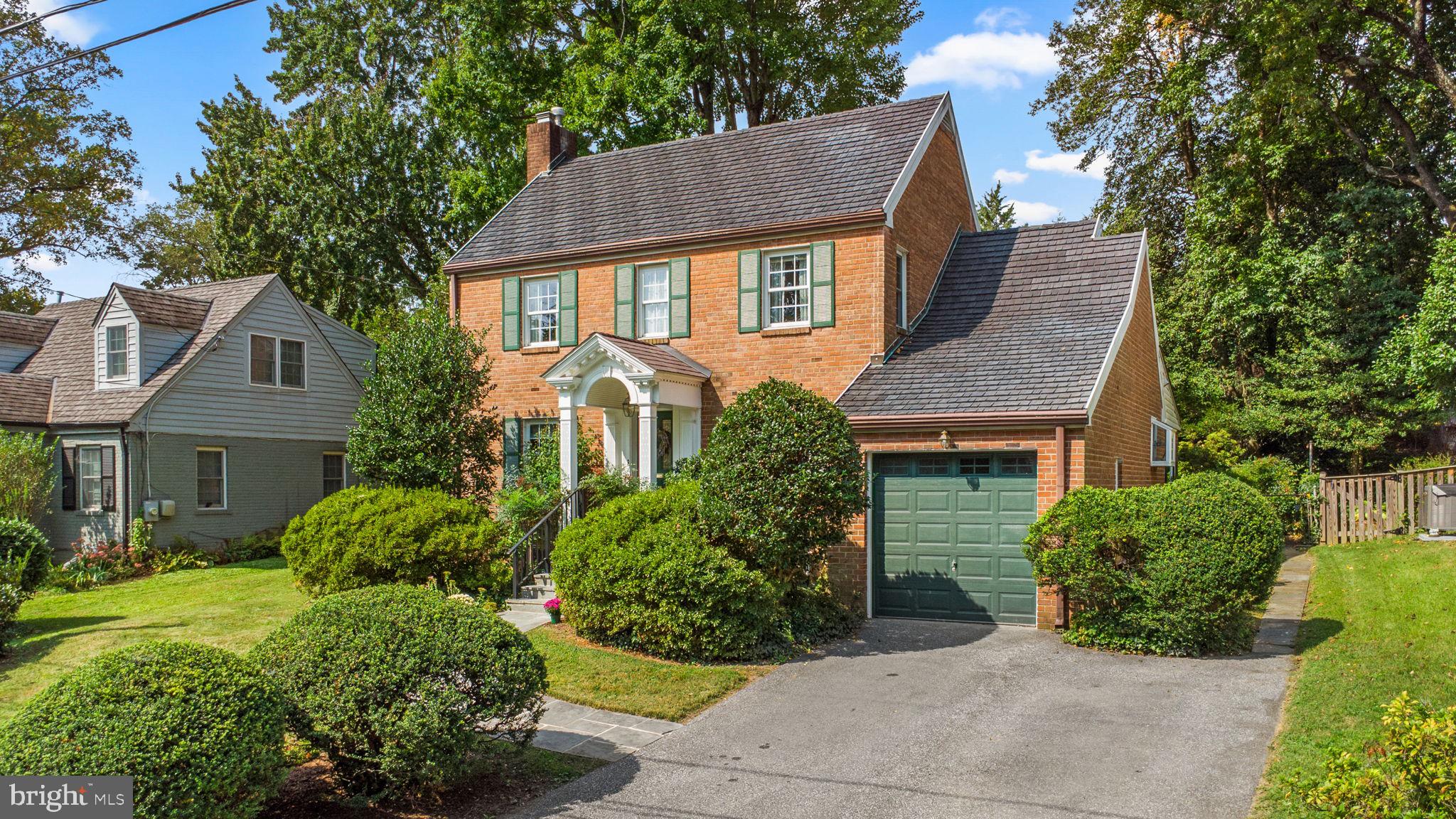9508 Bruce Drive Silver Spring, MD 20901 - Photo 2 of 50 a front view of a house with a yard