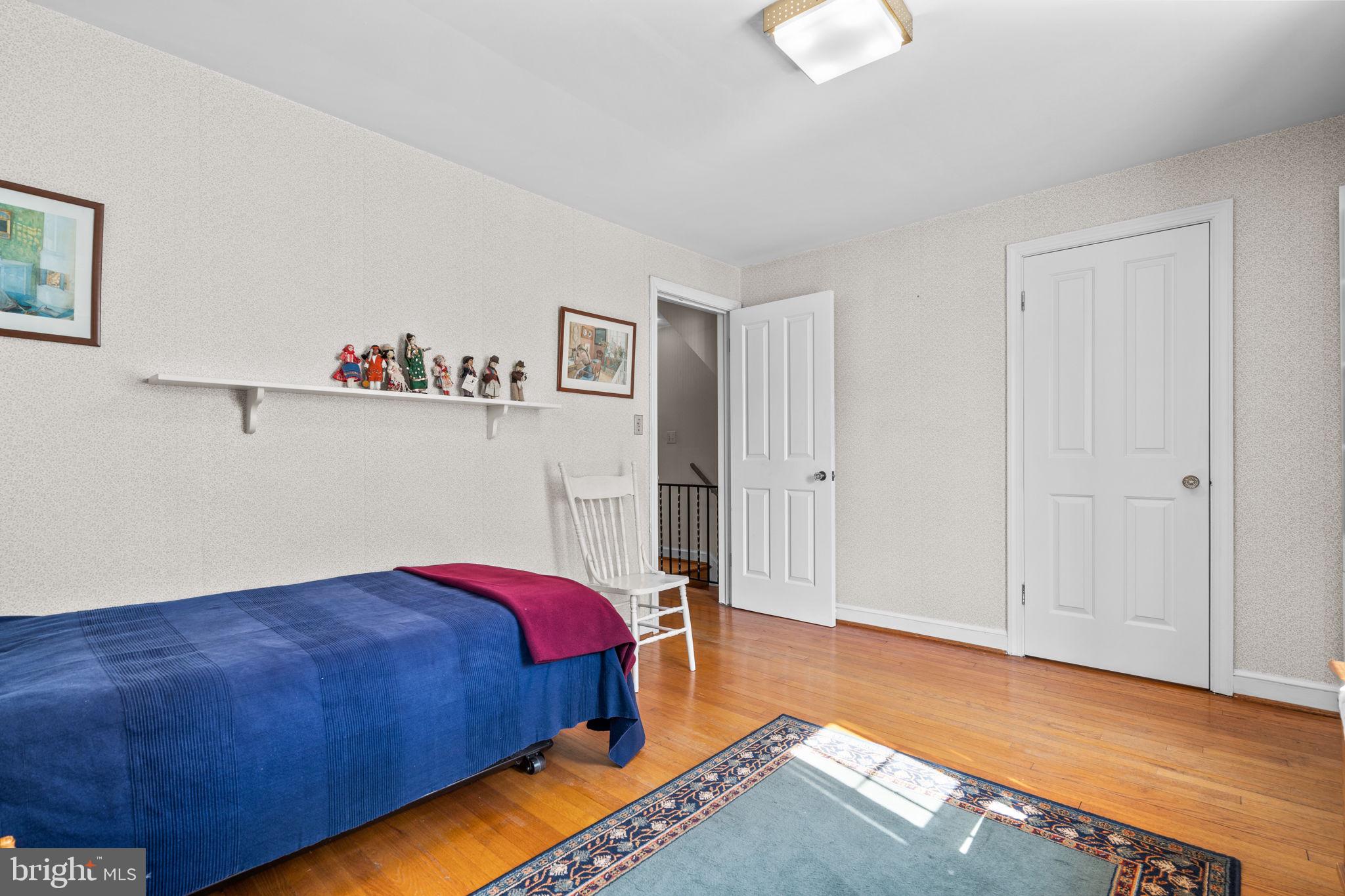 9508 Bruce Drive Silver Spring, MD 20901 - Photo 23 of 50 a bedroom with a bed and a window