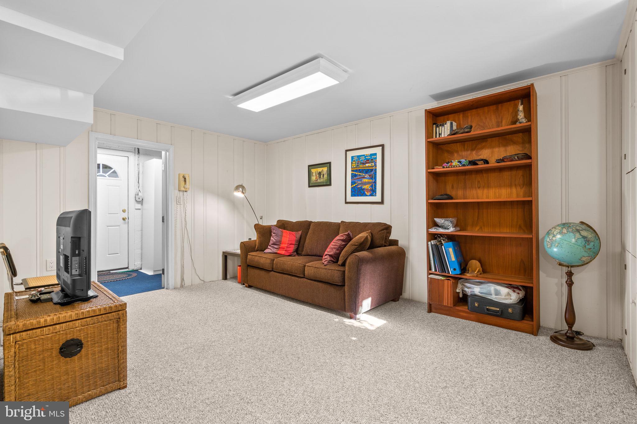 9508 Bruce Drive Silver Spring, MD 20901 - Photo 35 of 50 a living room with furniture and a window