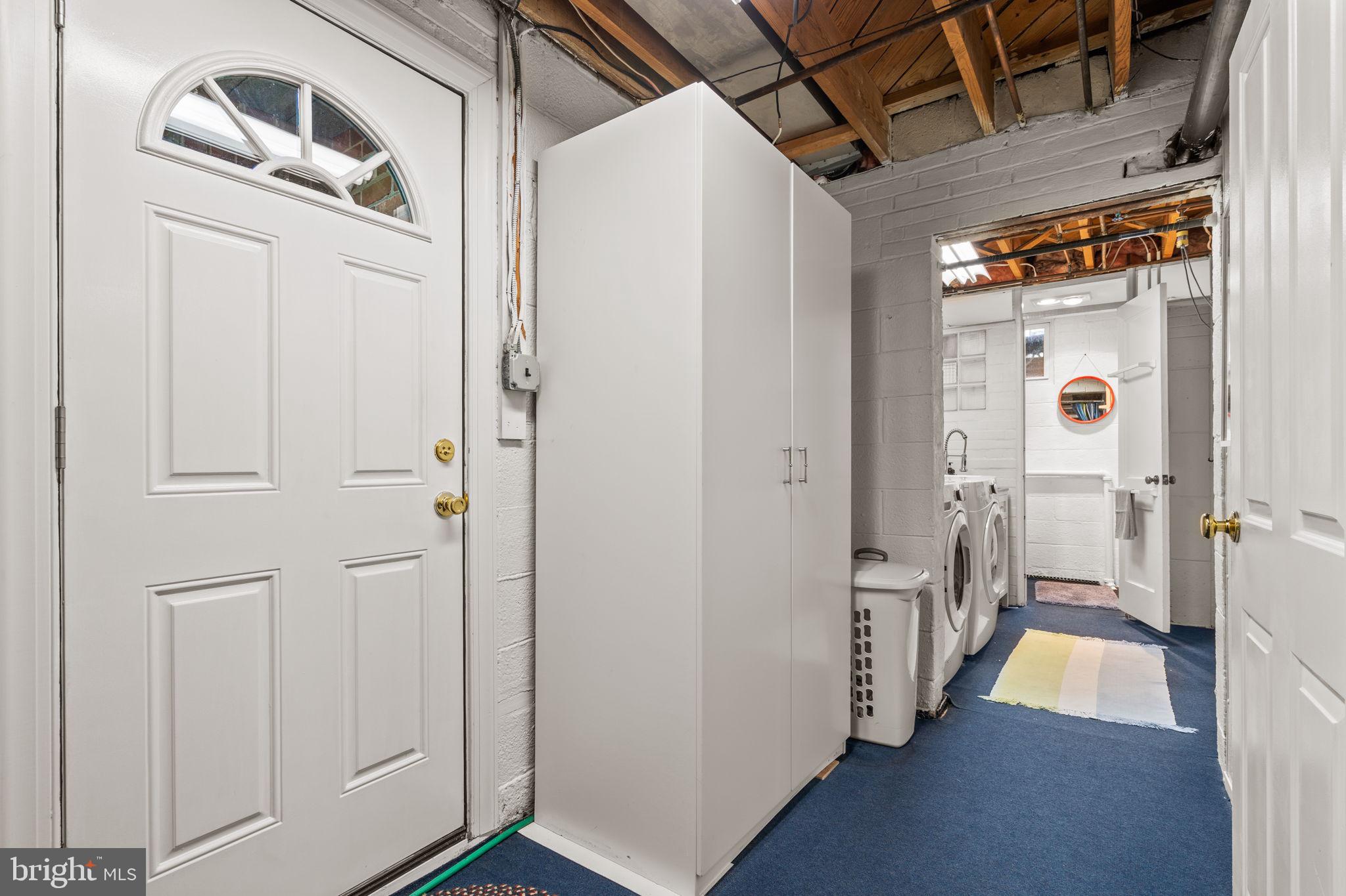 9508 Bruce Drive Silver Spring, MD 20901 - Photo 36 of 50 a view of a hallway with wooden floor and entryway