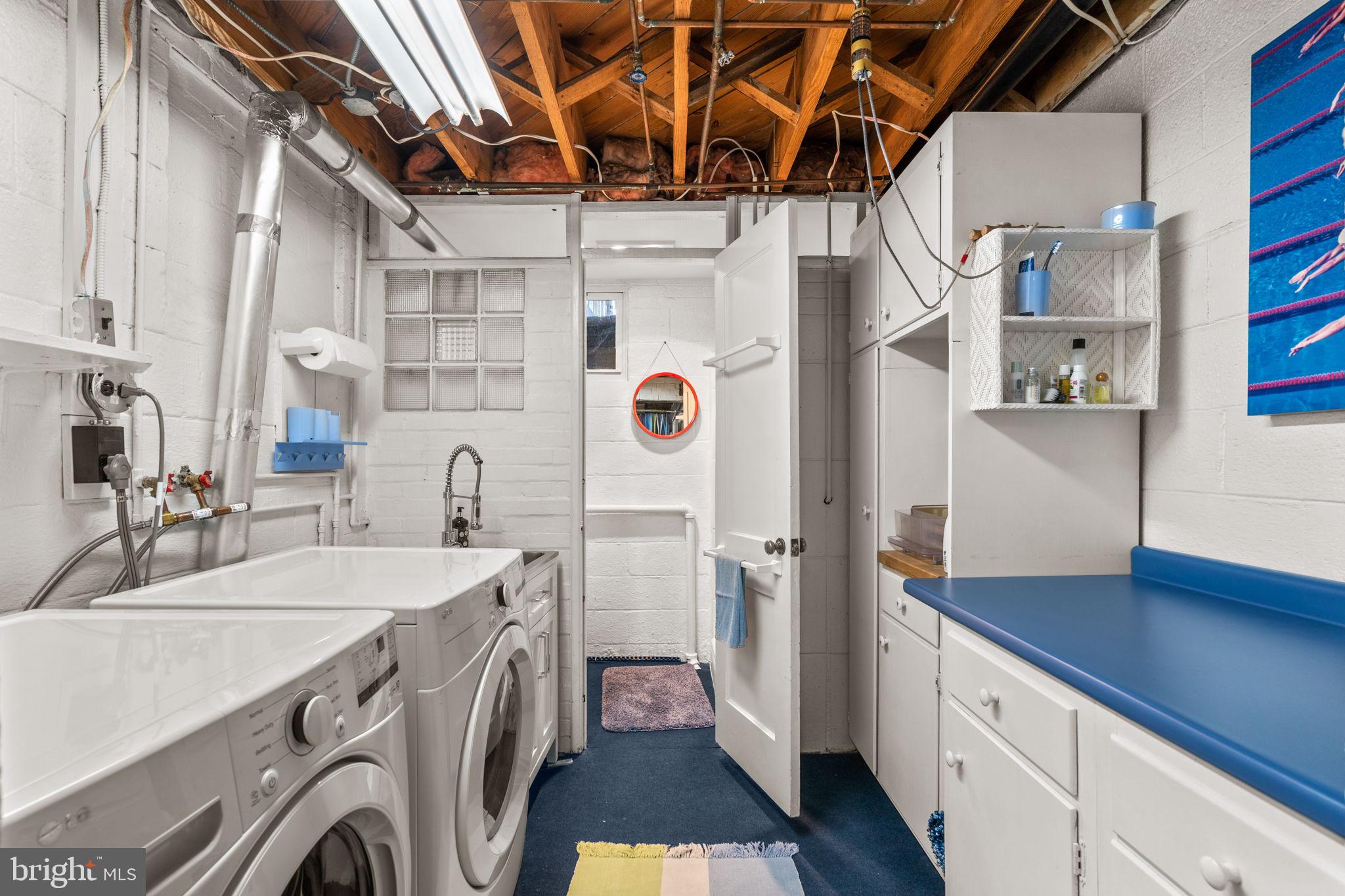 9508 Bruce Drive Silver Spring, MD 20901 - Photo 37 of 50 a utility room with cabinets