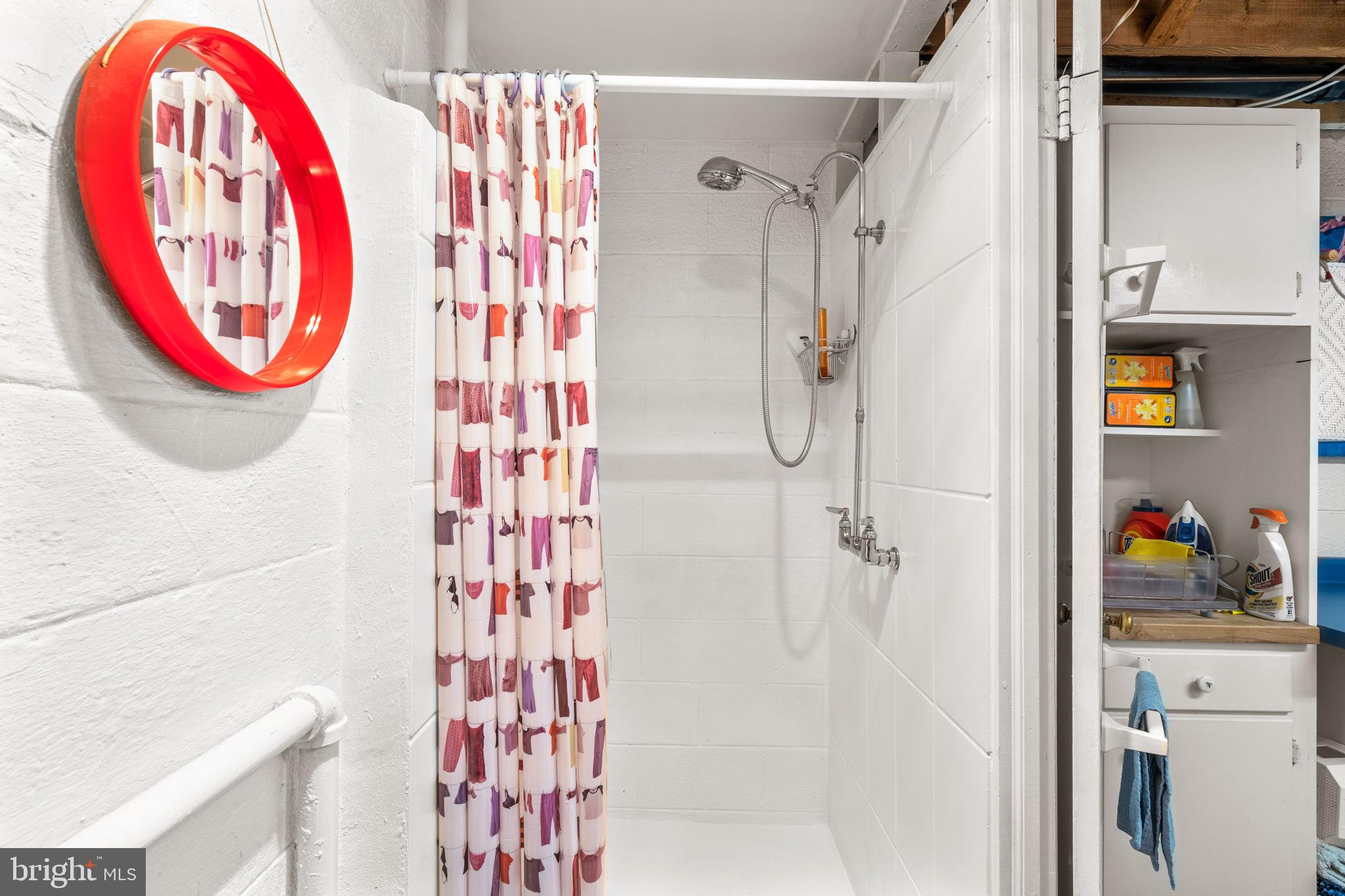 9508 Bruce Drive Silver Spring, MD 20901 - Photo 38 of 50 a bathroom with a sink and a mirror