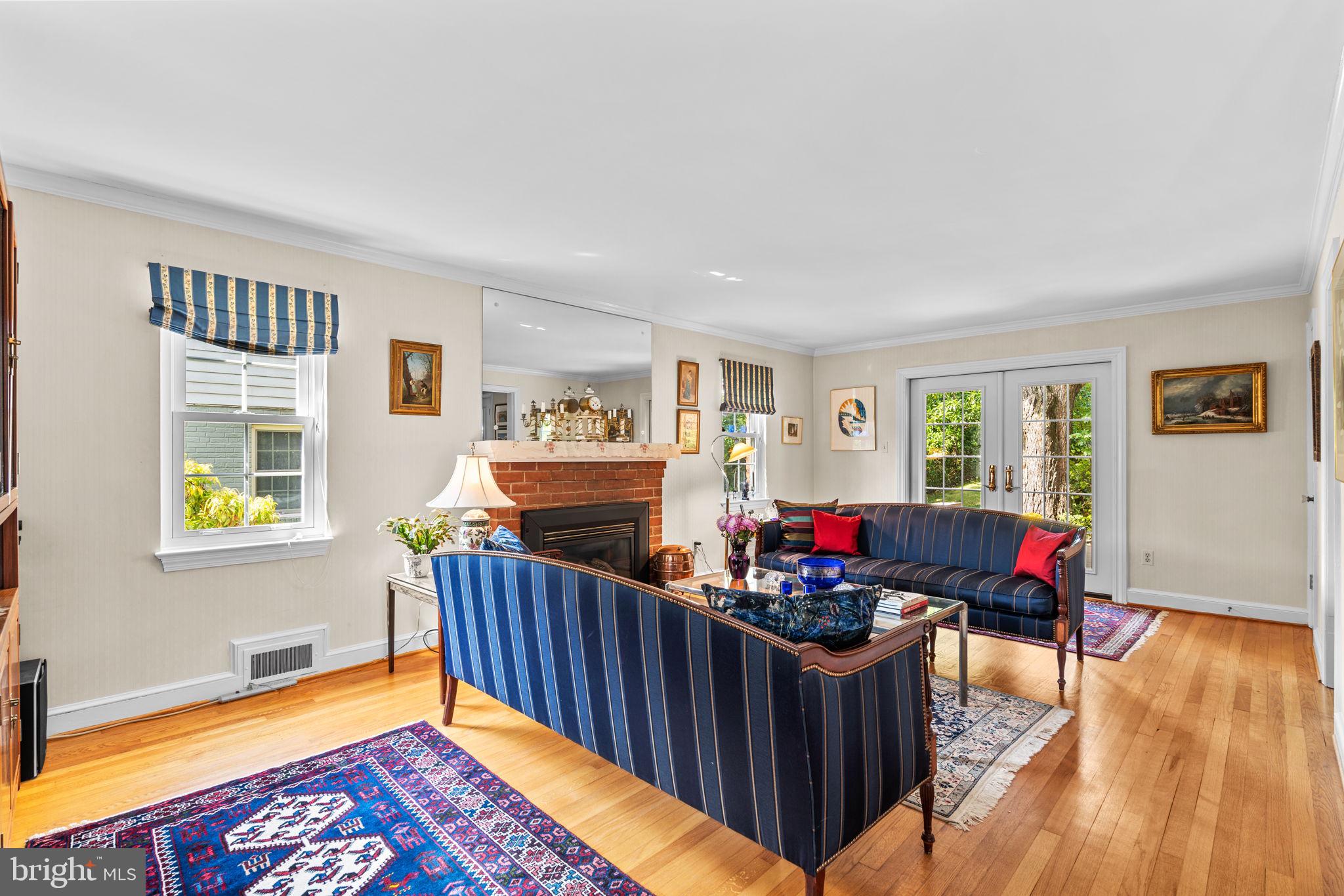 9508 Bruce Drive Silver Spring, MD 20901 - Photo 5 of 50 a living room with furniture and a wooden floor