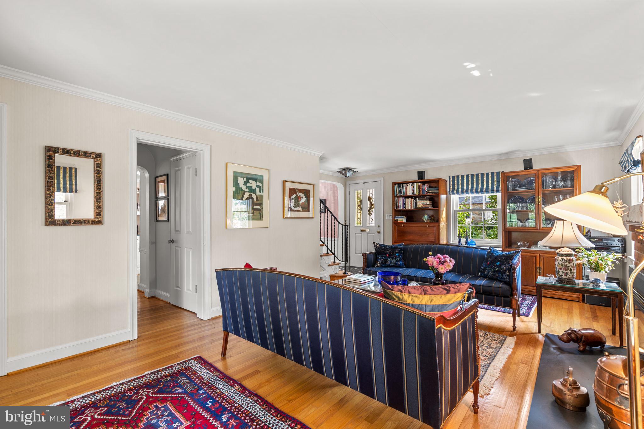 9508 Bruce Drive Silver Spring, MD 20901 - Photo 7 of 50 a bed room with furniture and a wooden floor