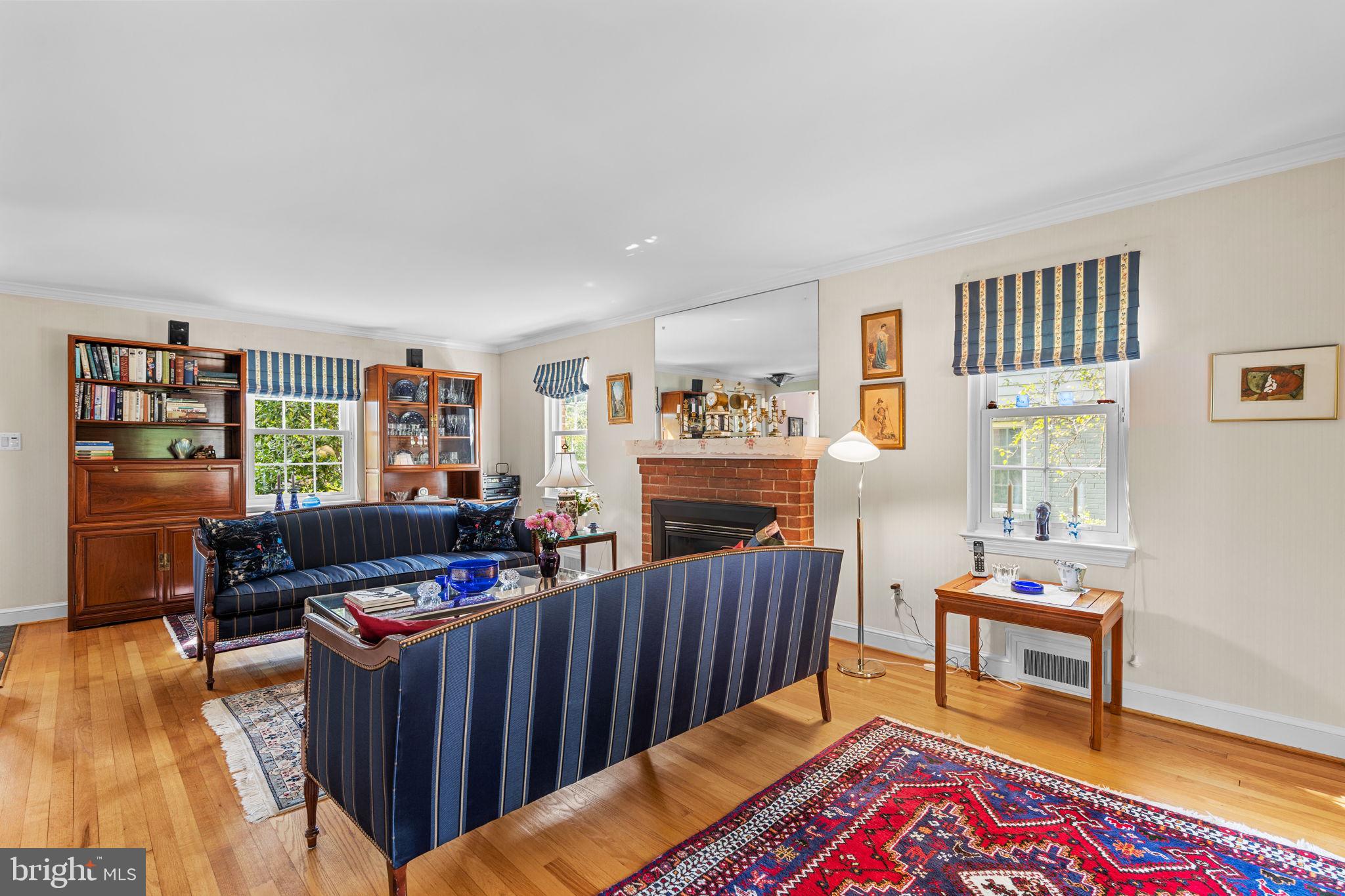 9508 Bruce Drive Silver Spring, MD 20901 - Photo 8 of 50 a bedroom with furniture and a book shelf