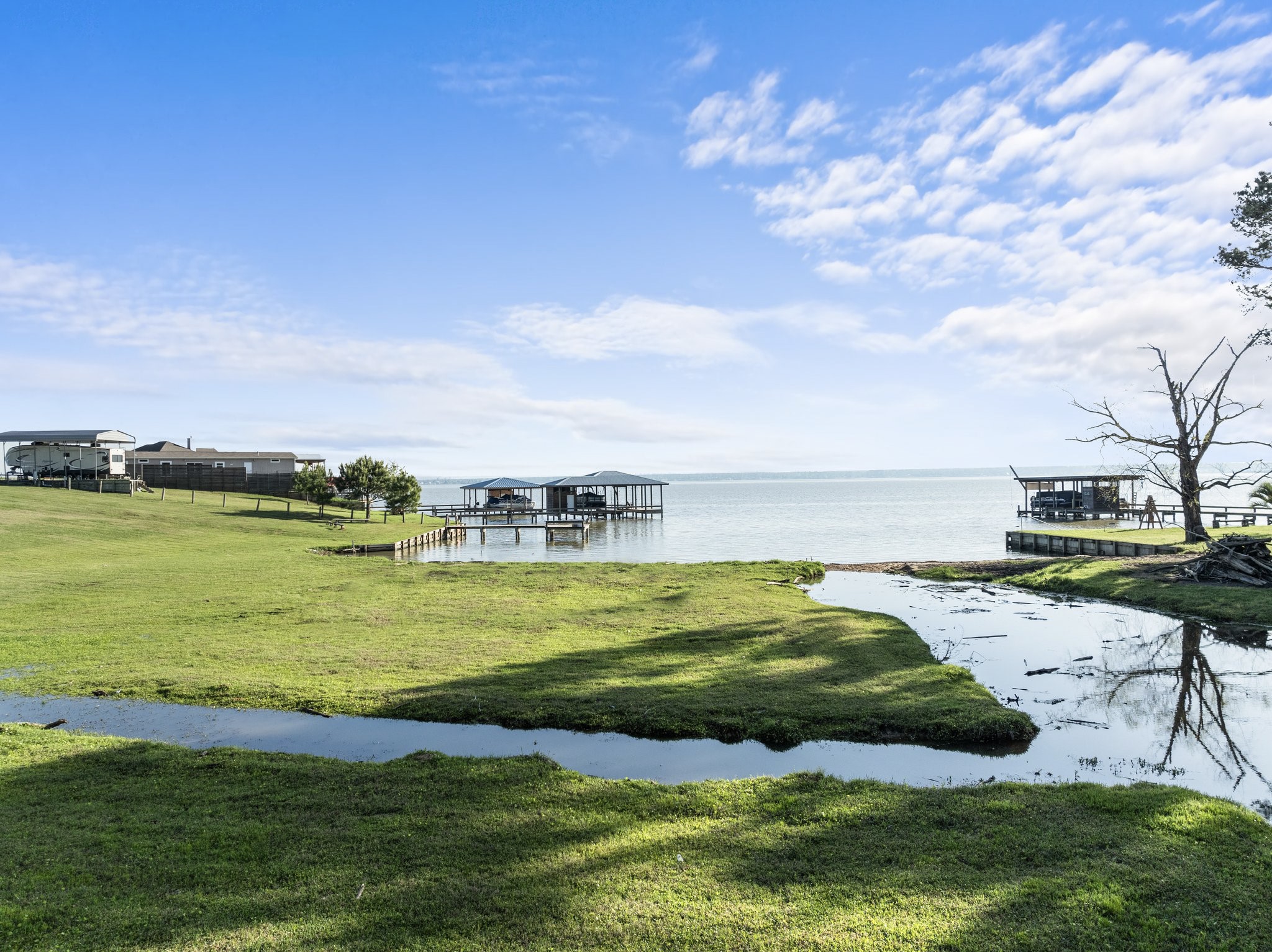 500 Lagoon Drive Point Blank, TX 77364 - Photo 22 of 23 a view of an ocean and beach