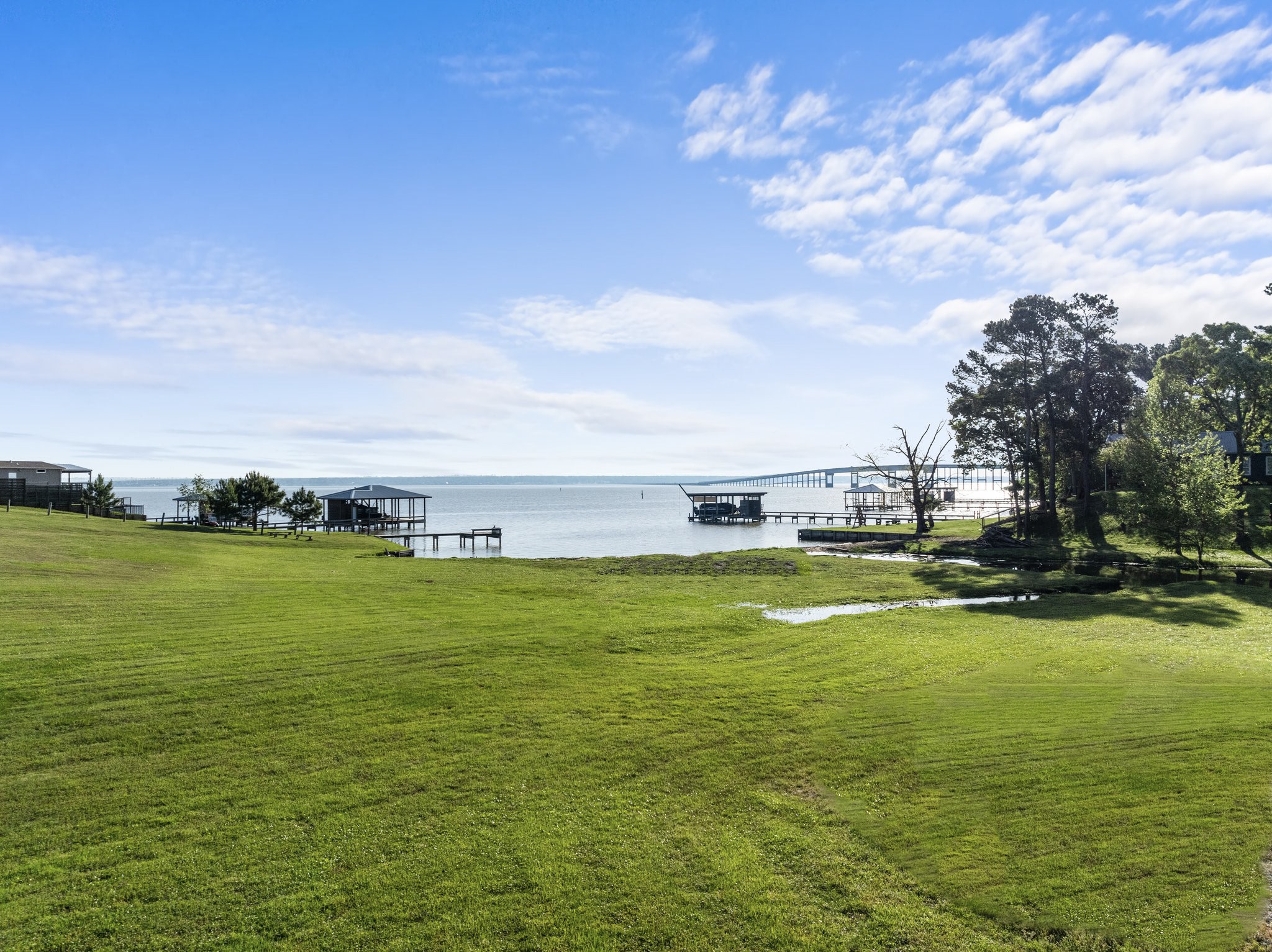 500 Lagoon Drive Point Blank, TX 77364 - Photo 3 of 23 a view of an ocean and beach