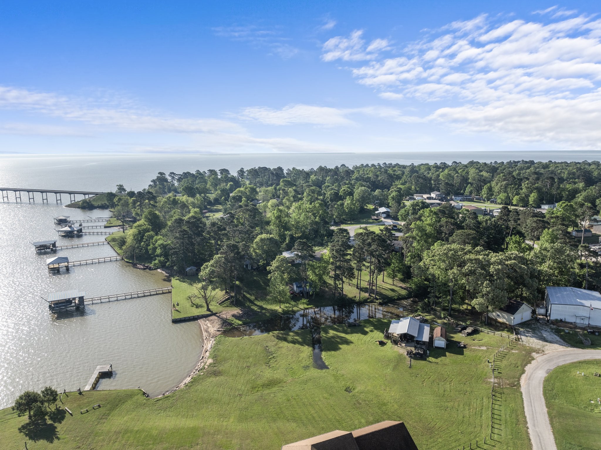 500 Lagoon Drive Point Blank, TX 77364 - Photo 4 of 23 an aerial view of a house with a yard