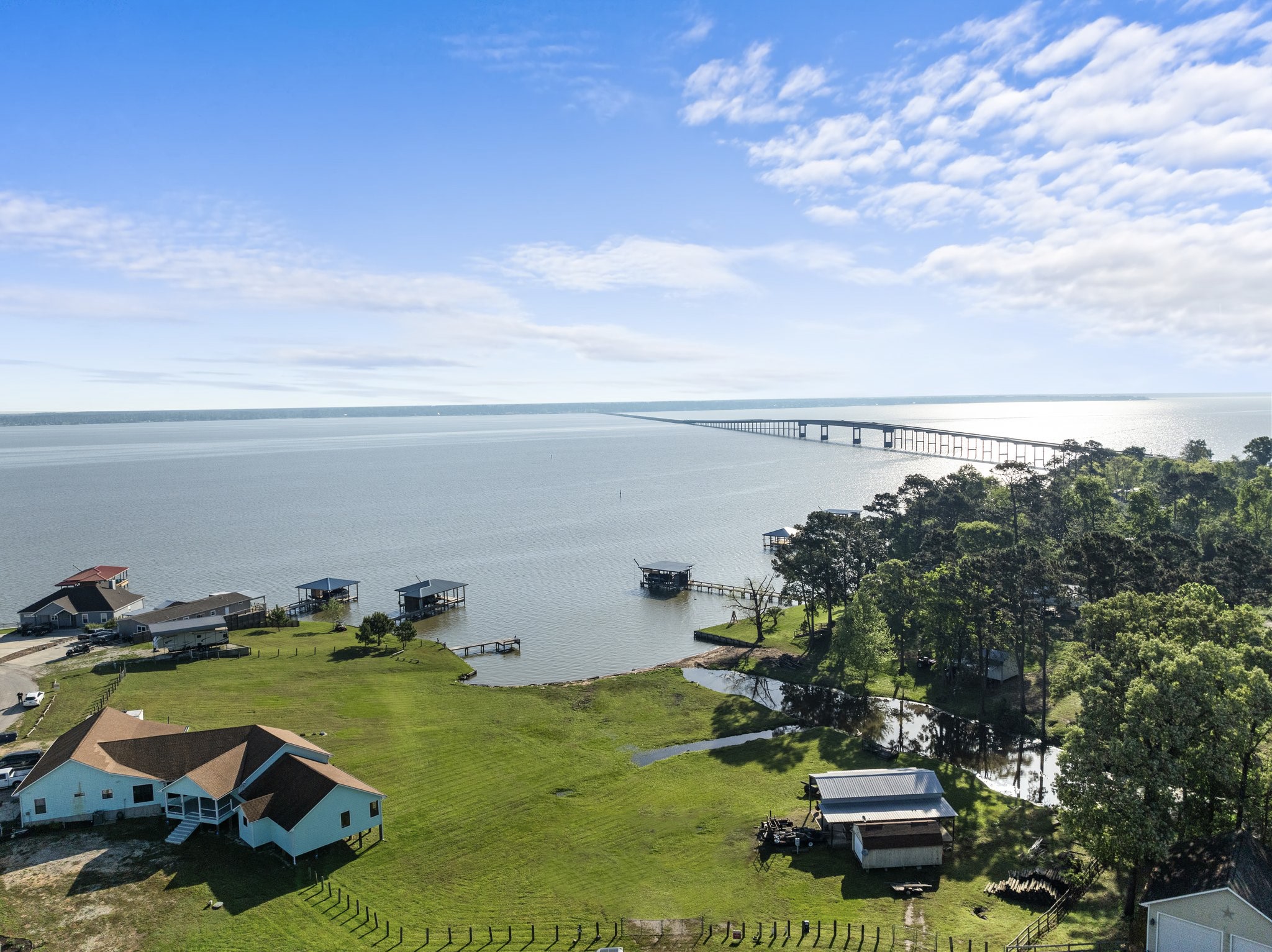 500 Lagoon Drive Point Blank, TX 77364 - Photo 6 of 23 a view of a ocean with beach