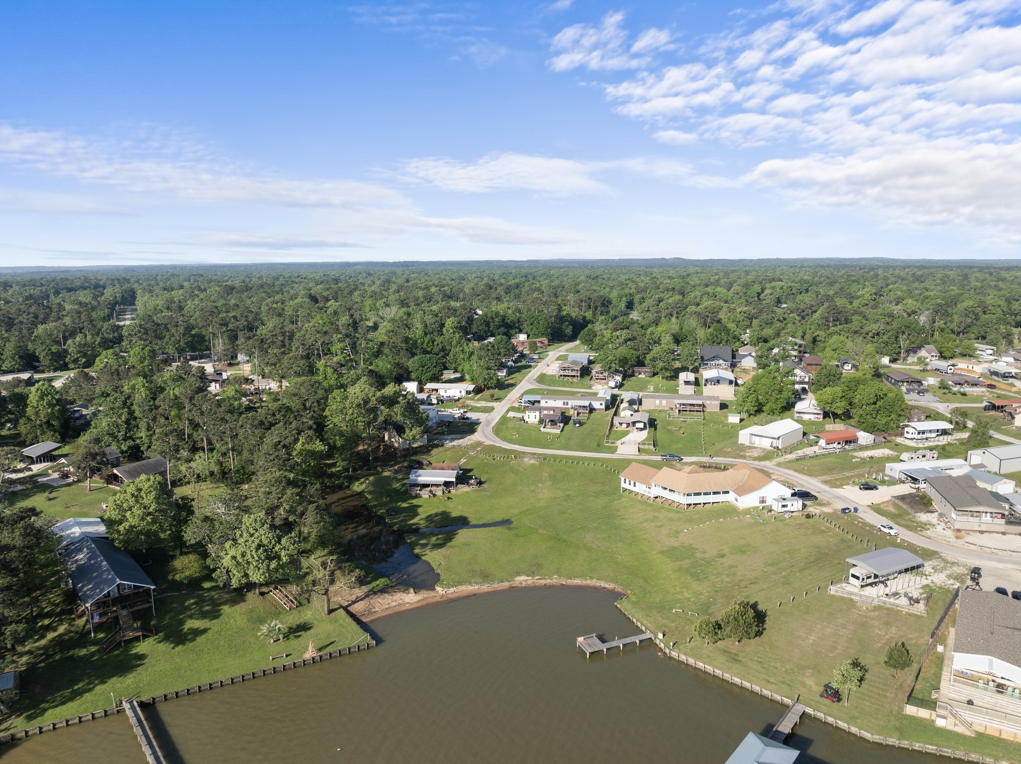 500 Lagoon Drive Point Blank, TX 77364 - Photo 8 of 23 an aerial view of residential houses with outdoor space