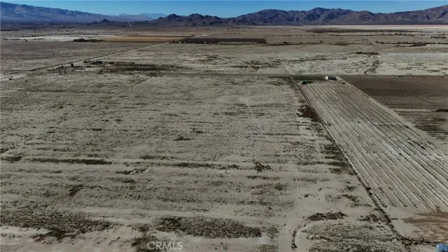 a view of a large body of water and mountain view