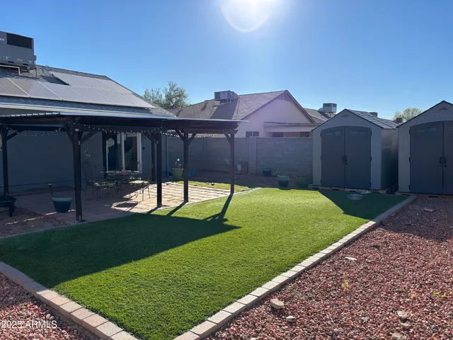 a view of a back yard of the house