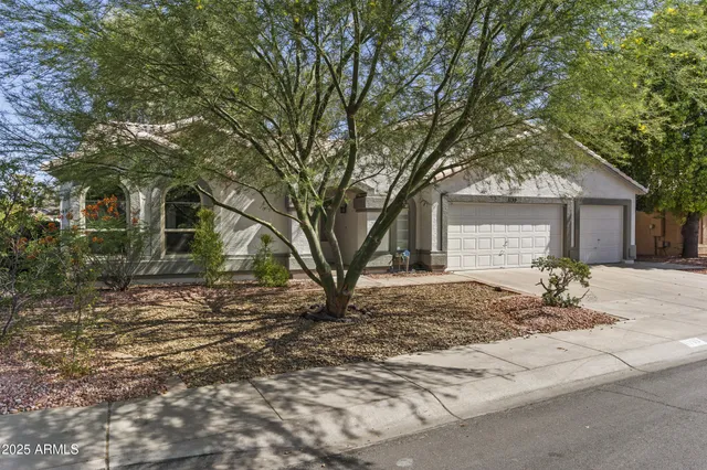 a view of a livingroom with an empty space and a window