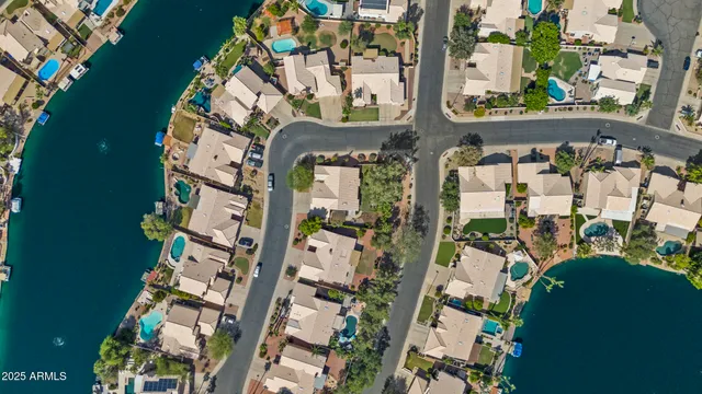 a view of a room with wooden floor and window