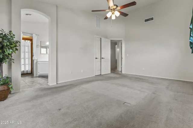 a bathroom with a glass door