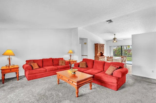 a living room with furniture and a couch
