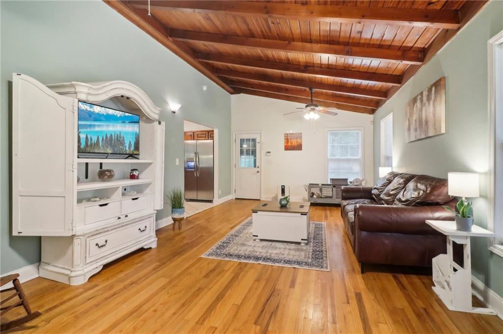 130 Carroll Street Temple, GA 30179 - Photo 4 of 30 a living room with furniture and wooden floors