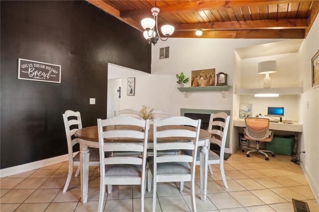130 Carroll Street Temple, GA 30179 - Photo 7 of 30 a view of a dining room with furniture and chandelier
