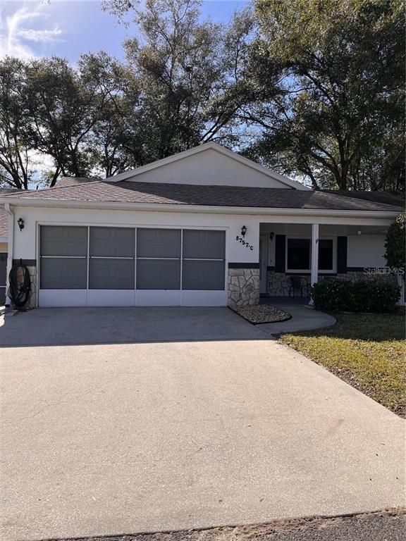8757 Southwest 97th Lane Road, Unit C Ocala, FL 34481 - Photo 1 of 21