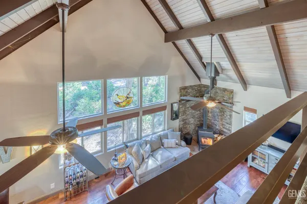 a living room with large windows