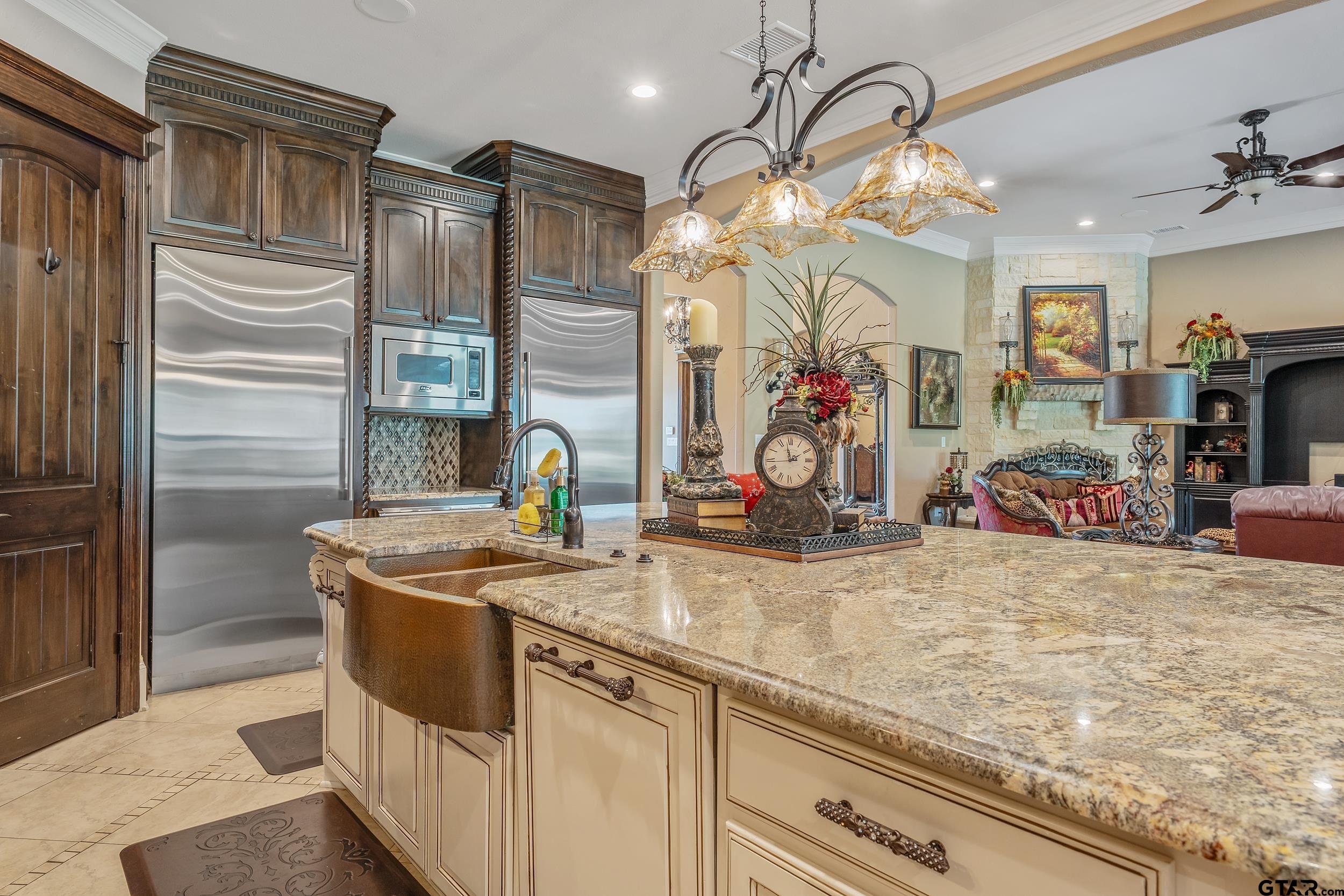 17521 Biltmore Circle Tyler, TX 75703 - Photo 14 of 48 a kitchen with stainless steel appliances granite countertop a sink and cabinets
