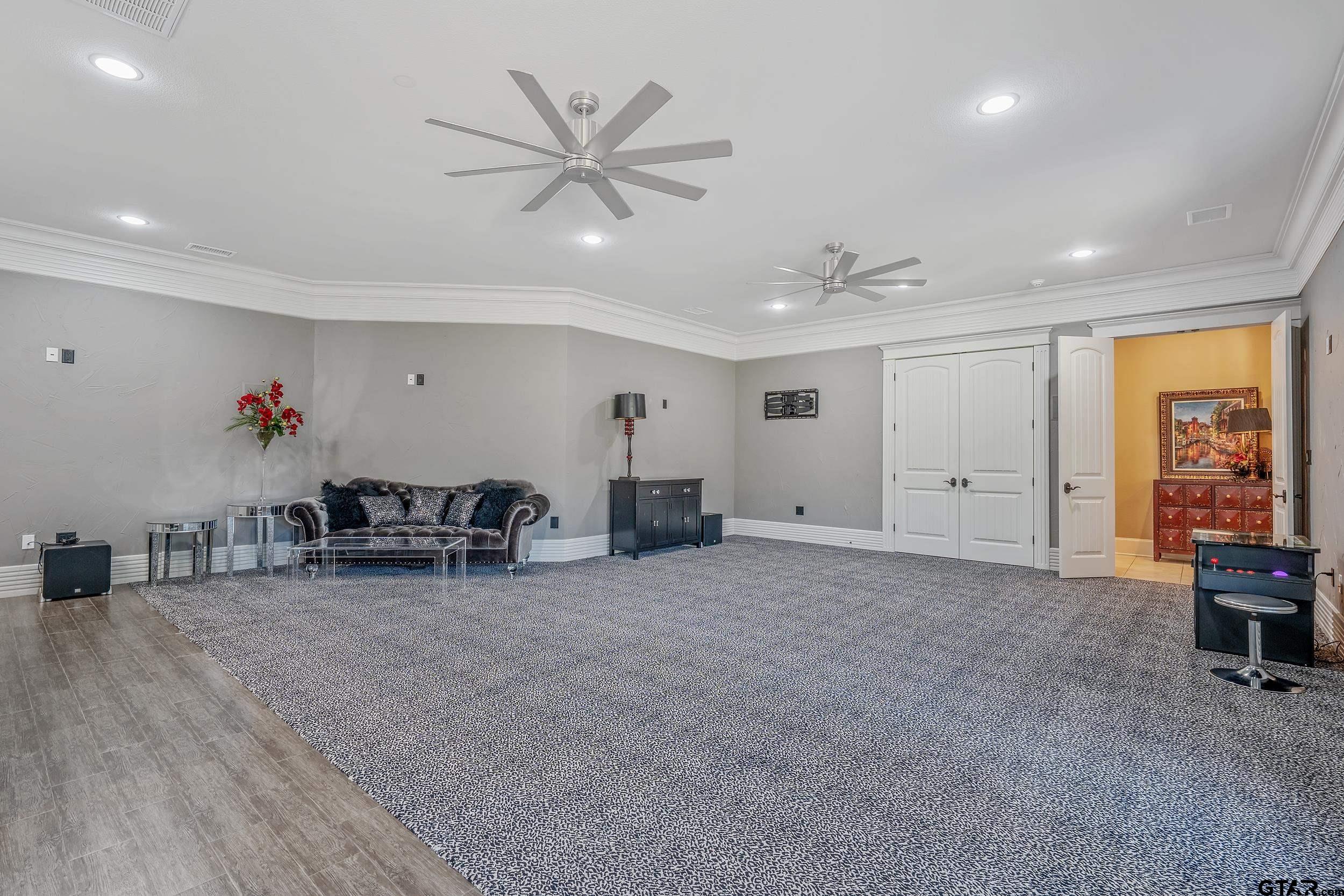 17521 Biltmore Circle Tyler, TX 75703 - Photo 36 of 48 a view of a livingroom with furniture and a ceiling fan