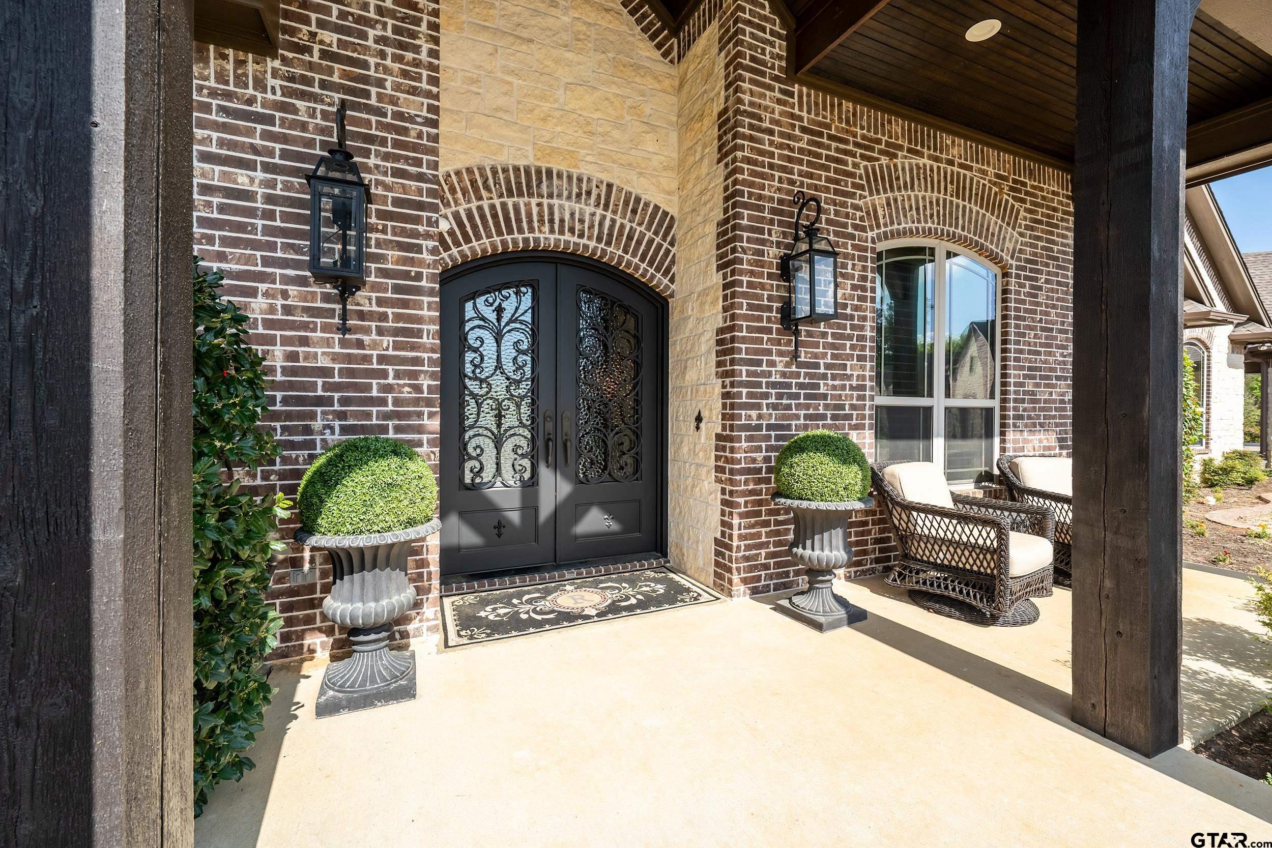 17521 Biltmore Circle Tyler, TX 75703 - Photo 4 of 48 a front view of a house with glass windows