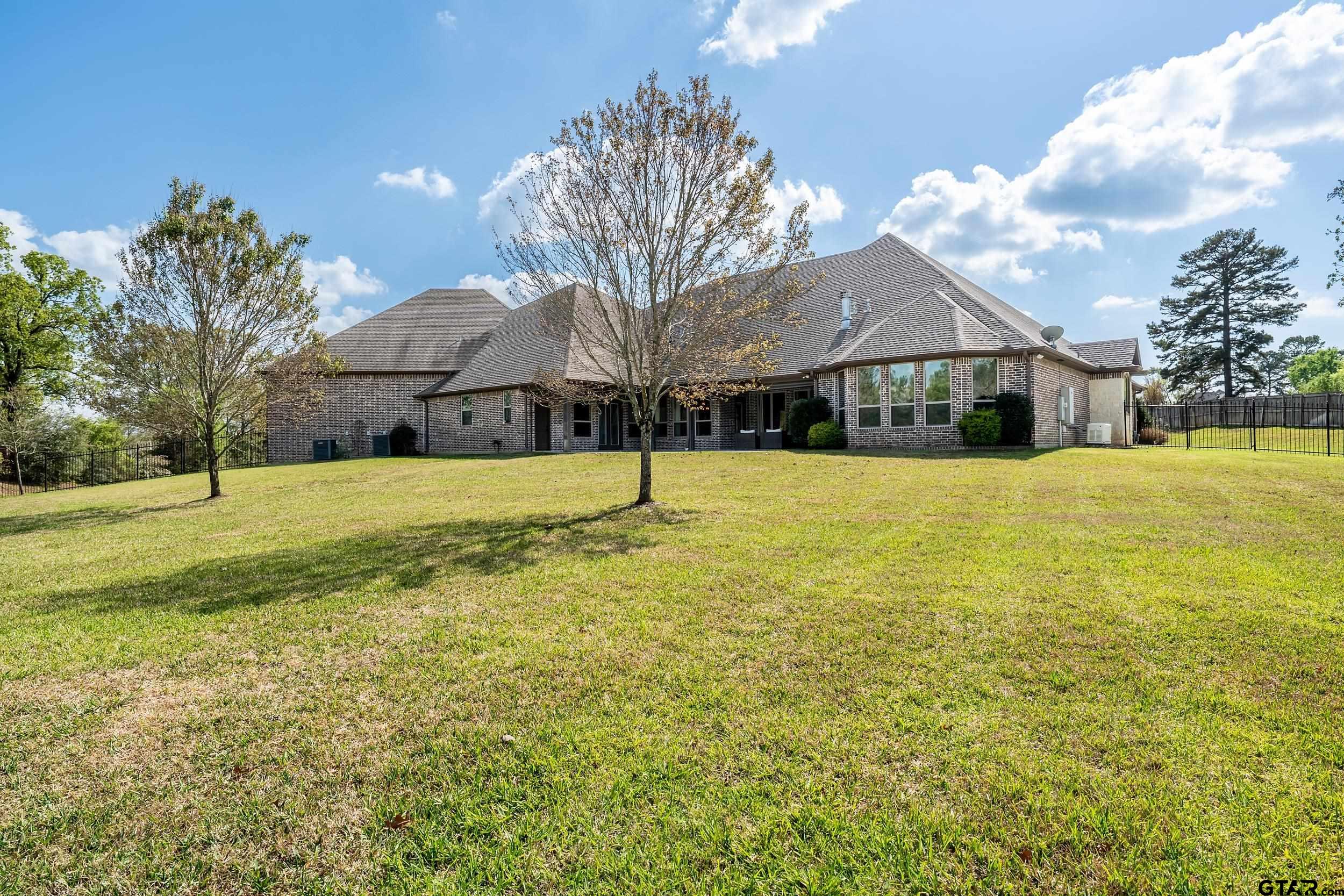 17521 Biltmore Circle Tyler, TX 75703 - Photo 44 of 48 a view of a house with a yard