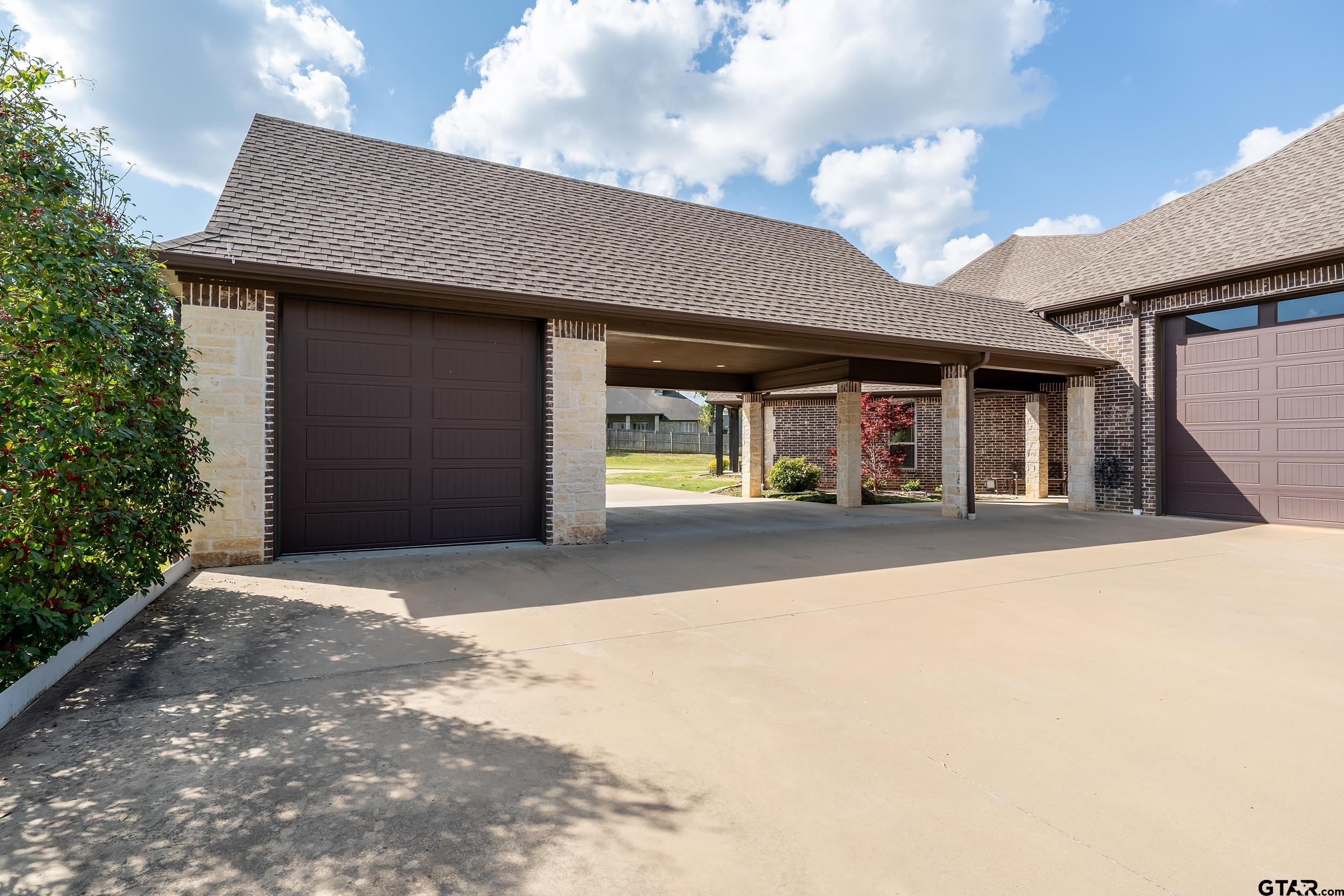 17521 Biltmore Circle Tyler, TX 75703 - Photo 47 of 48 a front view of a house with garage