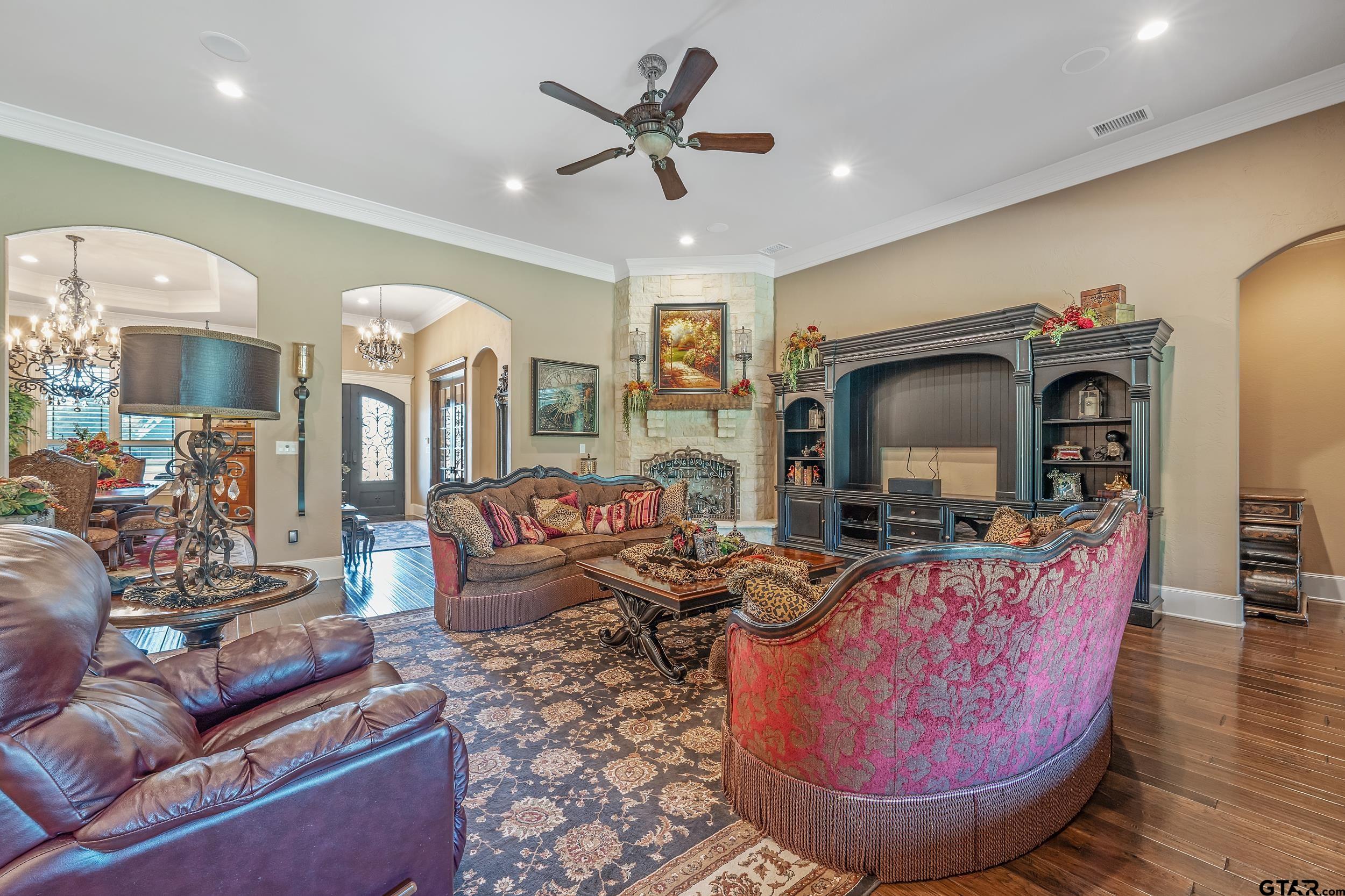 17521 Biltmore Circle Tyler, TX 75703 - Photo 8 of 48 a living room with furniture a flat screen tv and kitchen view