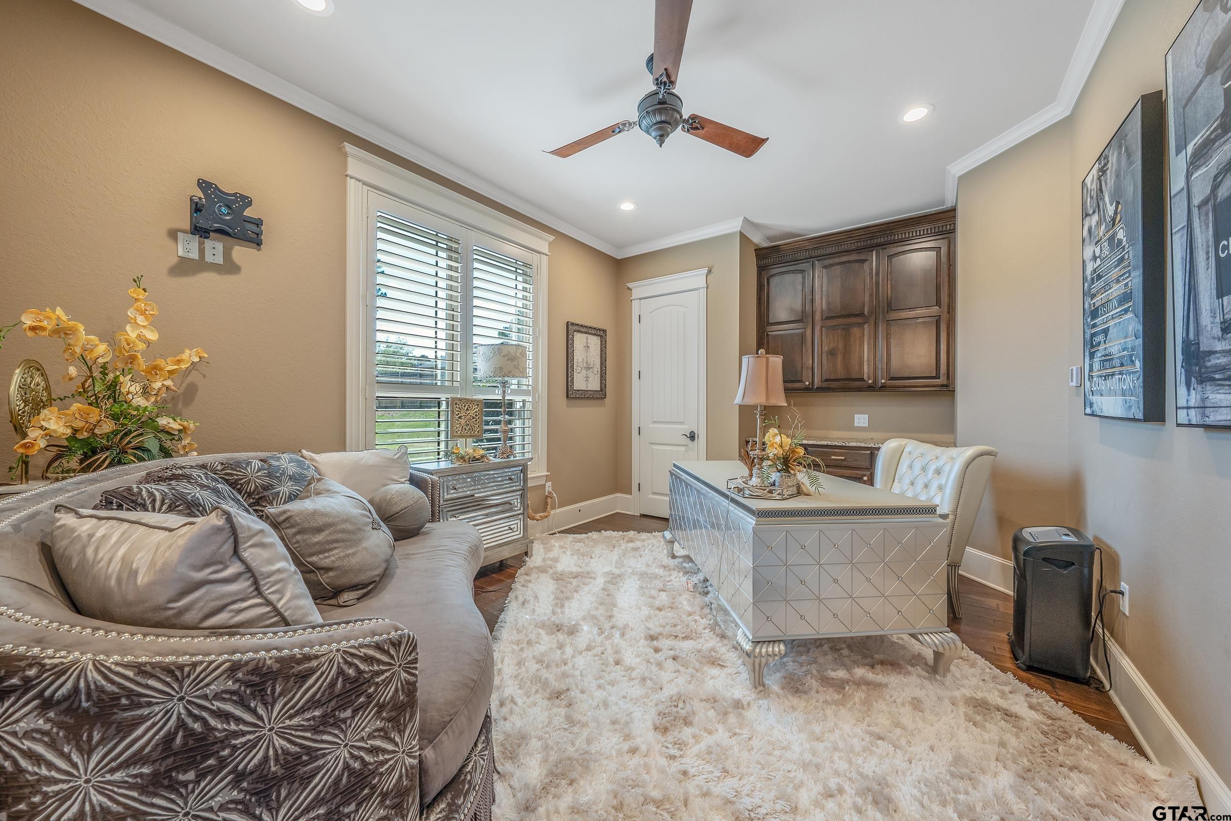 17521 Biltmore Circle Tyler, TX 75703 - Photo 9 of 48 a living room with furniture and a large window