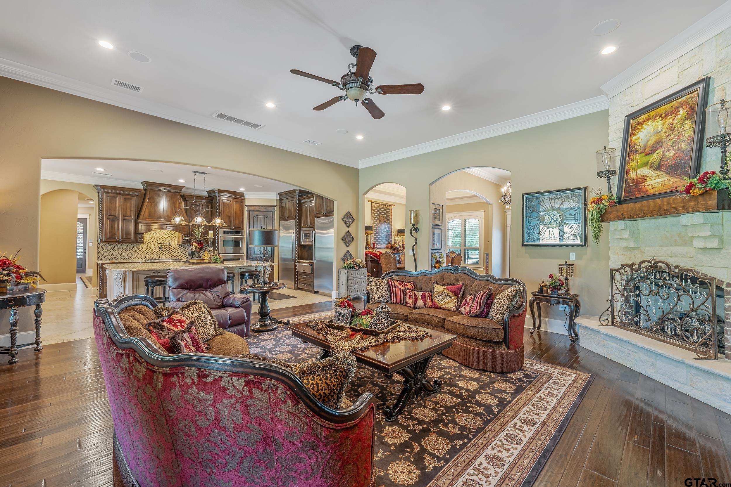 17521 Biltmore Circle Tyler, TX 75703 - Photo 10 of 48 a living room with fireplace furniture and a large window