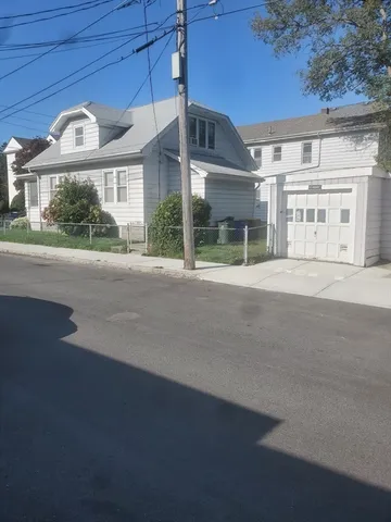 a view of a building with a street
