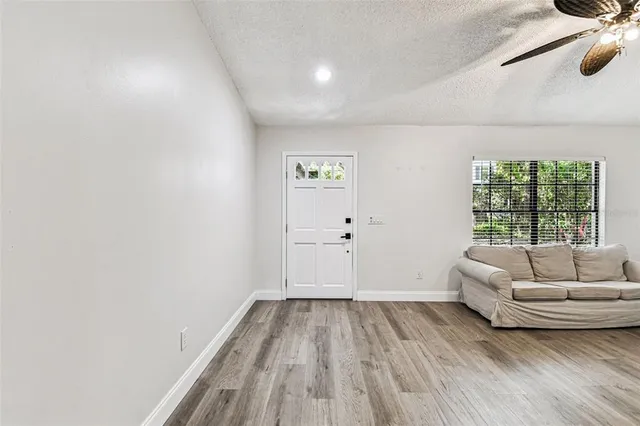 a view of livingroom with furniture and wooden floor