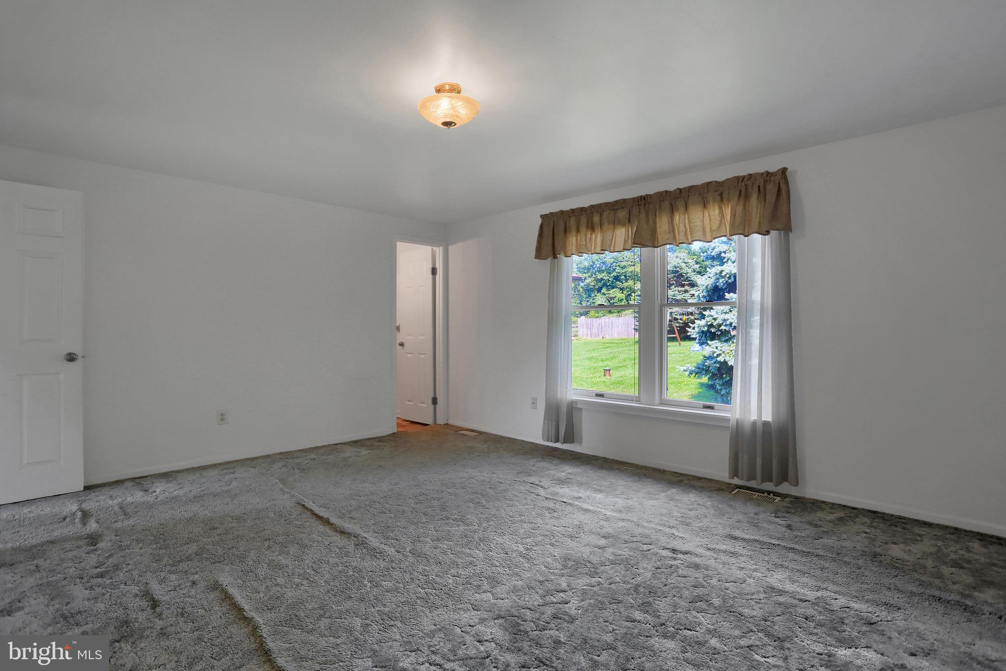 2302 Bachmans Valley Road Manchester, MD 21102 - Photo 22 of 57 Hardwood floor under carpet